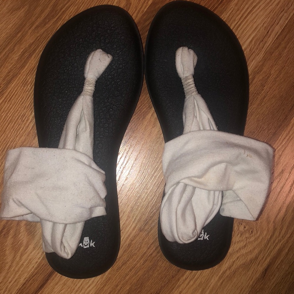 White Sanuk foam sandals